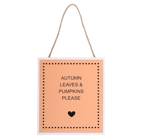 Peach wooden hanging plaque reading Autumn Leaves & Pumpkins Please with a dotted border, heart and jute cord
