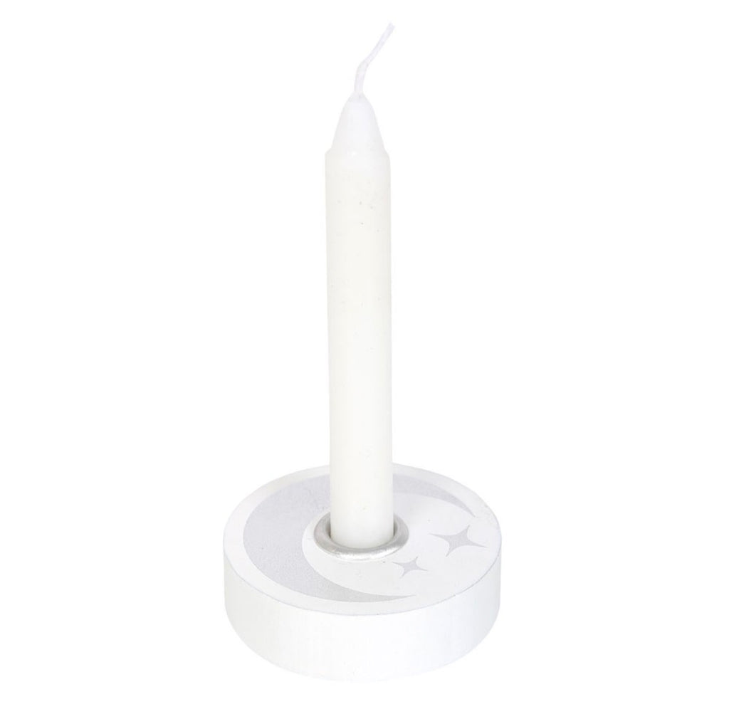 Top-down view of the white candle holder showing the silver crescent moon, stars and metal cup