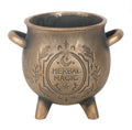 Plain side of the antiqued bronze cauldron pot showing its handles and three feet