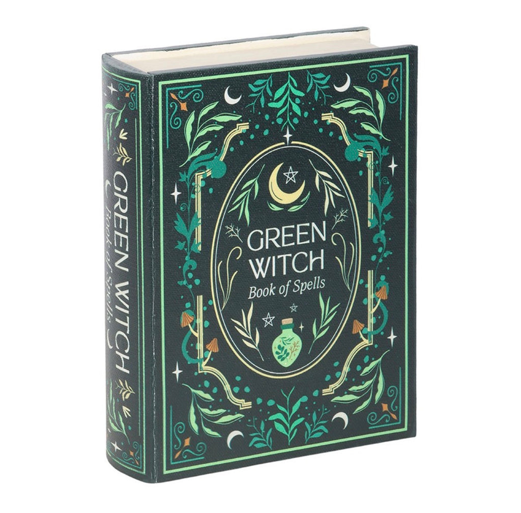 Green Witch Book of Spells box closed, looking like a hardback book with leaves, moons and a potion bottle