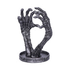 Skeleton hands heart jewellery stand - detail of hands