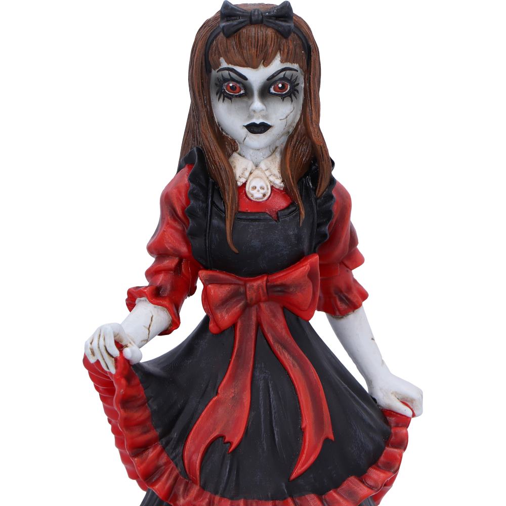 Gothic lolita doll figurine - lifestyle shot on dark wood