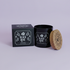 Black Rose - box and candle on purple background