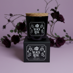 Black Rose - candle on box, purple background
