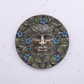 Green Man Plaque — front, gold stars