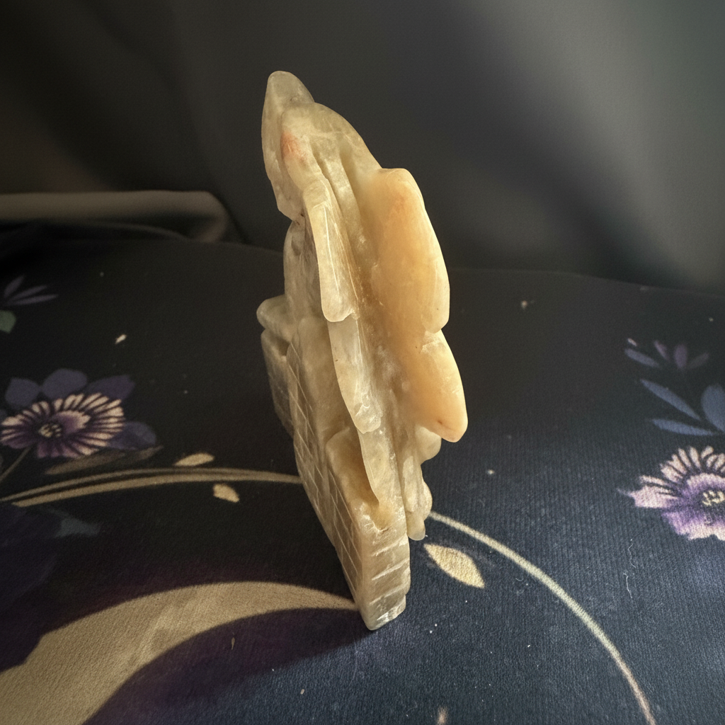 Side profile showing the depth of the moonstone dragon carving
