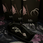 Black coffin trinket dish with crystal necklace and gift boxes
