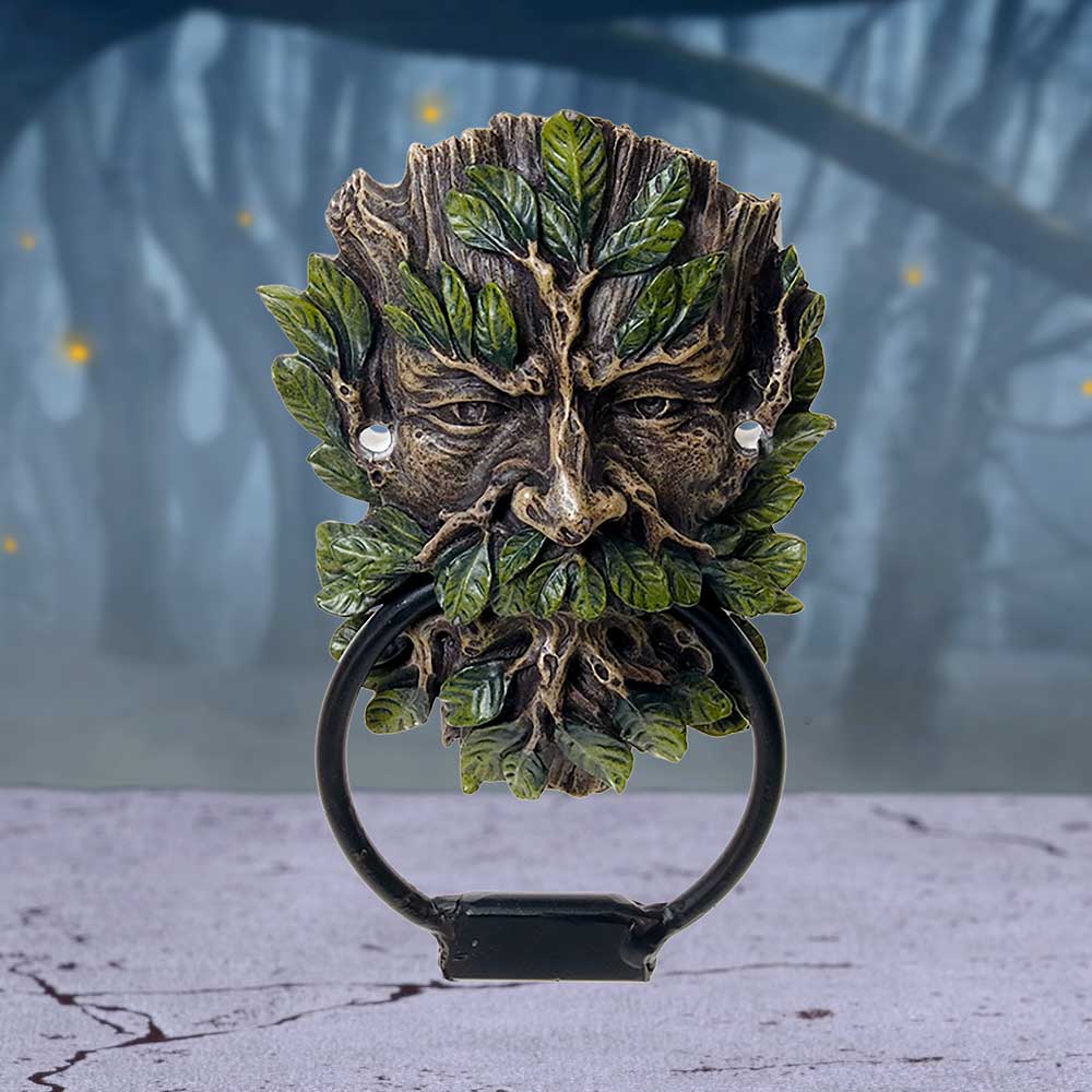 Green Man Door Knocker - lifestyle shot on marble surface with forest background