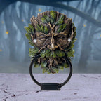 Green Man Door Knocker - lifestyle shot on marble surface with forest background