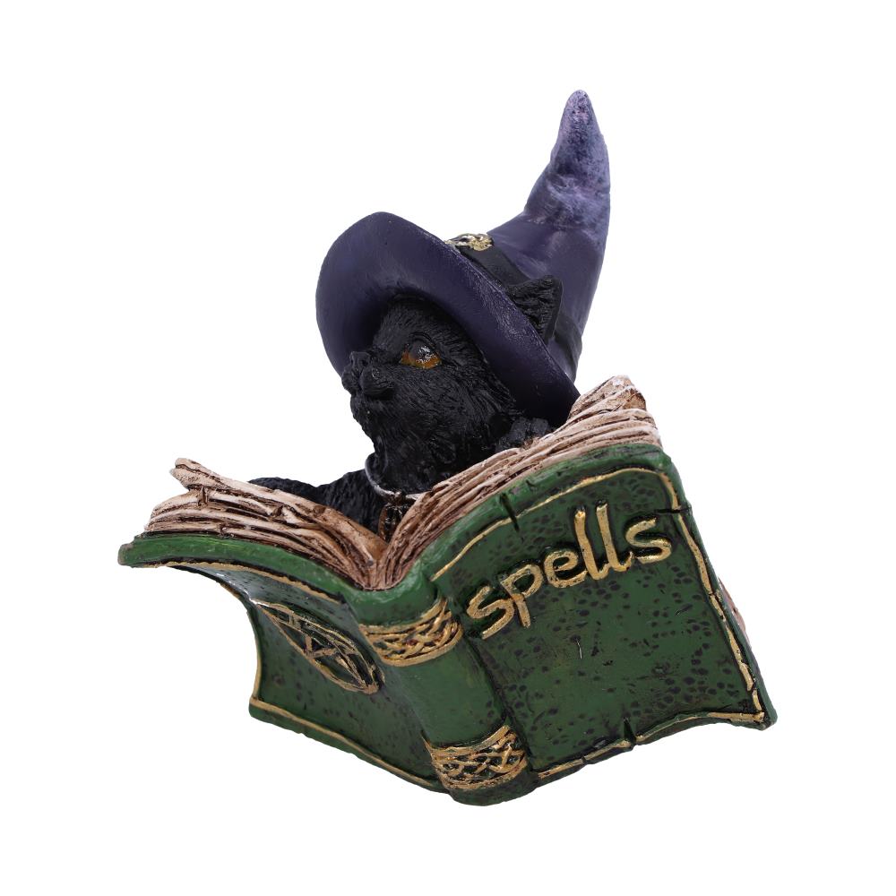 Witchy Black Cat Spell Book Figurine - three-quarter front view showing cat peering over book