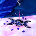 Triple Moon Pentagram Incense Holder - moody lifestyle shot with blue velvet, crystal beads and incense smoke