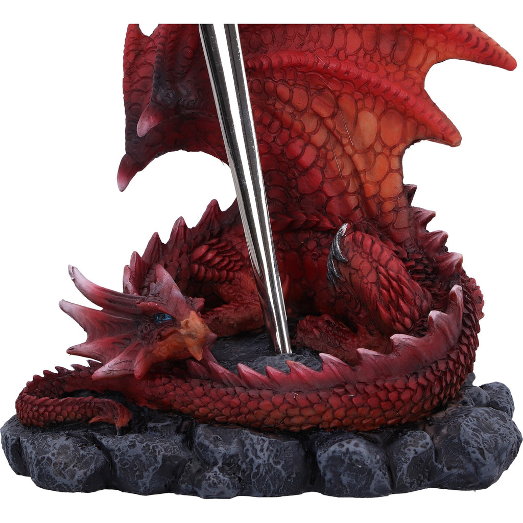Close-up of red dragon head and body coiled around rocky base