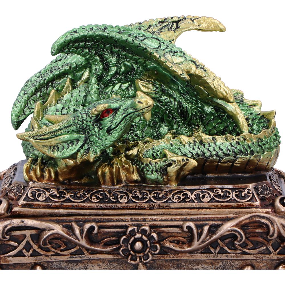 Green dragon trinket box open showing black velvet-lined interior