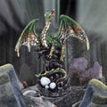 Green dragon with eggs figurine side angle view
