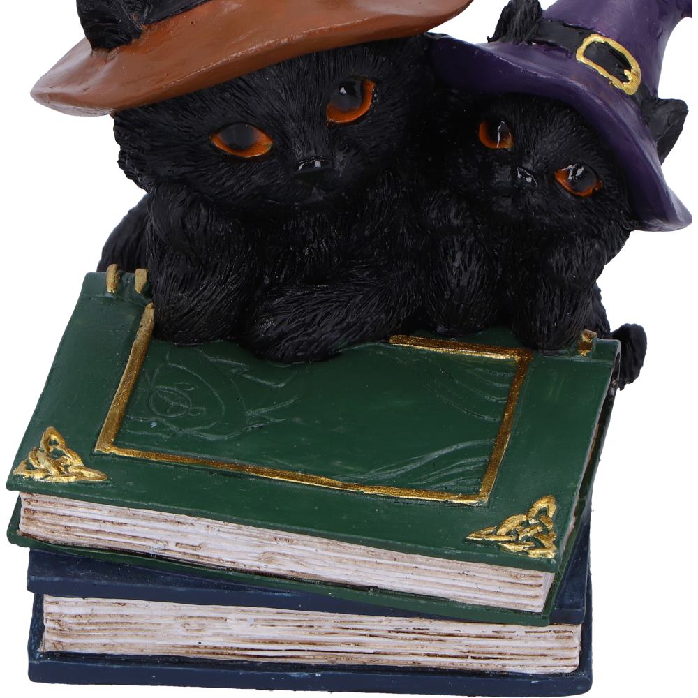 Witch kittens spell books figurine styled in Halloween moonlit scene